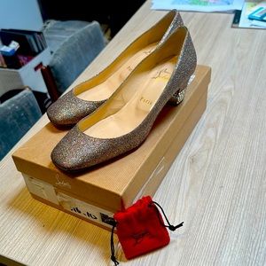 Christian Louboutin sparkly pumps
